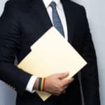 lgbtq businessman and folder pride month