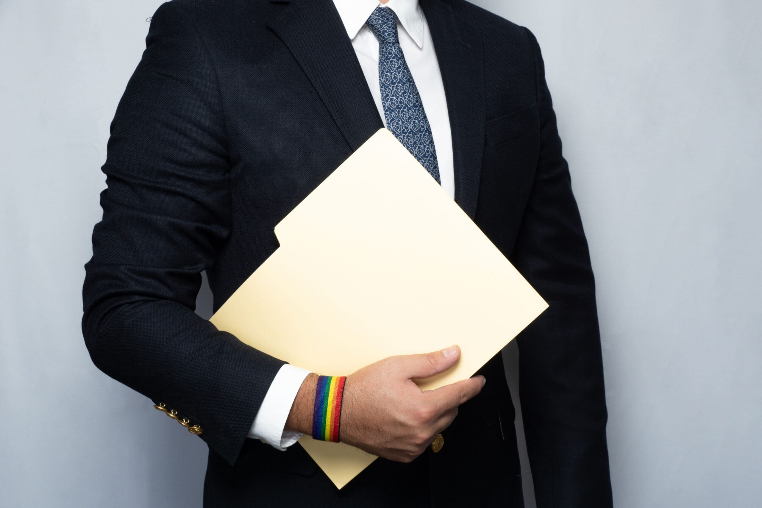lgbtq businessman and folder pride month