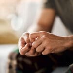 closeup of person hands, anxiety and mental health problem, therapy and psychology with trauma. fear, crisis and stress with depression, mistake and disaster with panic, abuse or addiction with pain